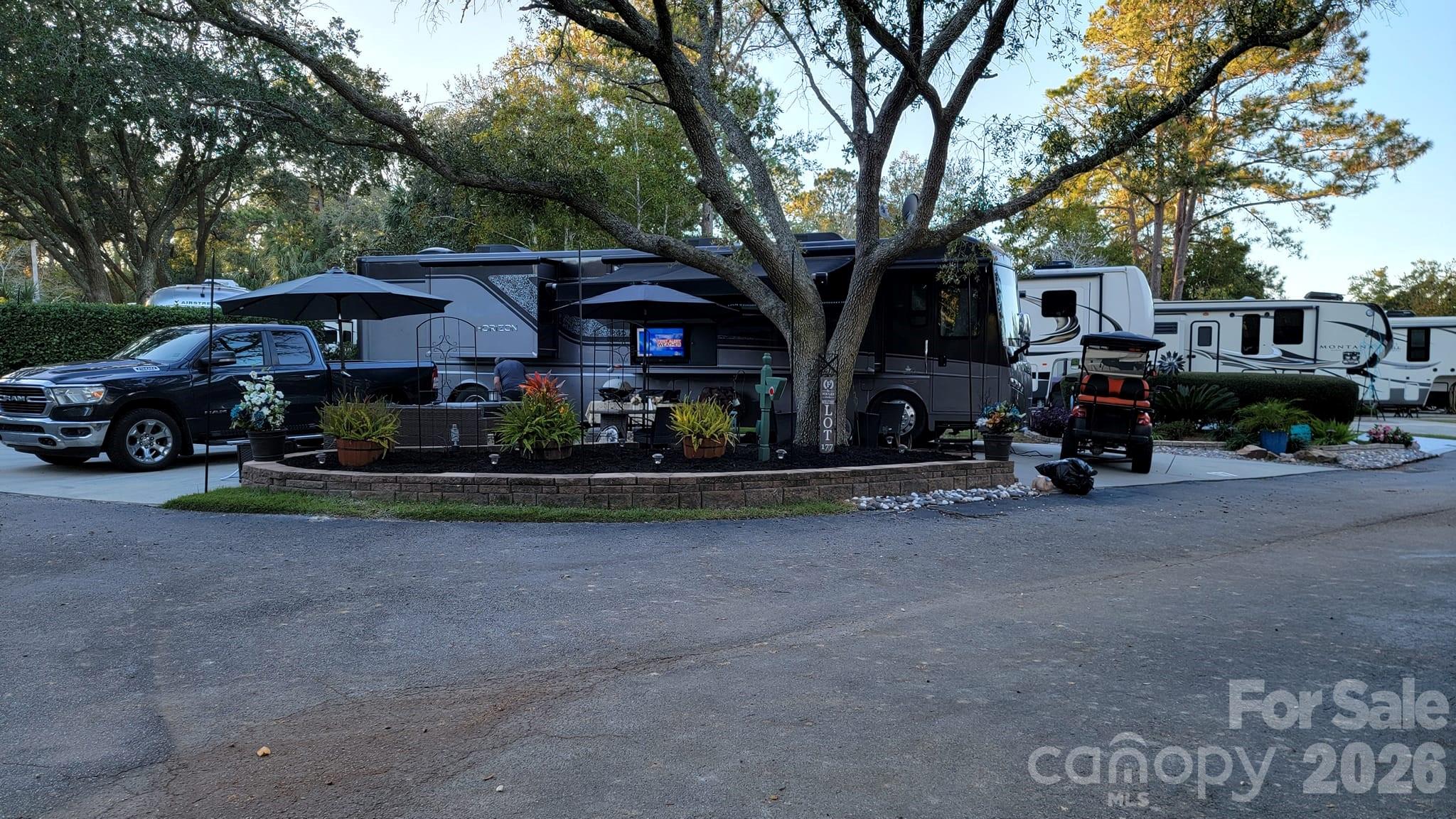 43B Jenkins Island Road, Unit 177 Hilton Head Island, SC 29926 - Photo 18 of 18 a view of a car in front of a house