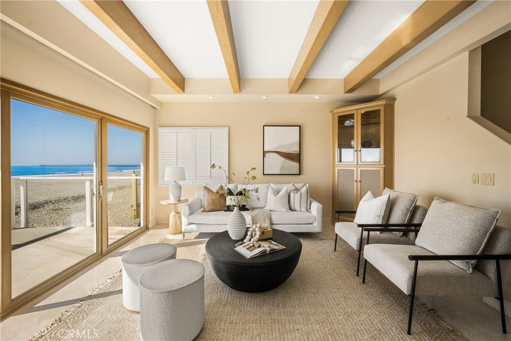 78 A Surfside Avenue Surfside, CA 90743 - Photo 13 of 45 a living room with furniture and a large window