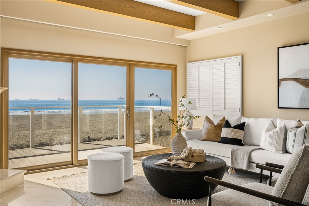 78 A Surfside Avenue Surfside, CA 90743 - Photo 14 of 45 a living room with furniture and a large window