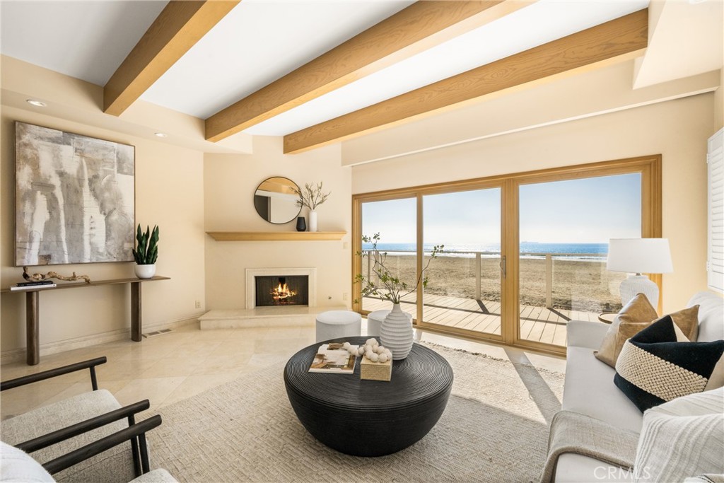78 A Surfside Avenue Surfside, CA 90743 - Photo 15 of 45 a living room with furniture and a fireplace