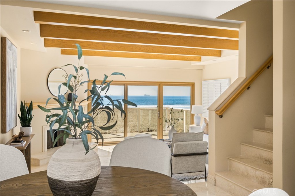 78 A Surfside Avenue Surfside, CA 90743 - Photo 22 of 45 a living room with furniture and a potted plant