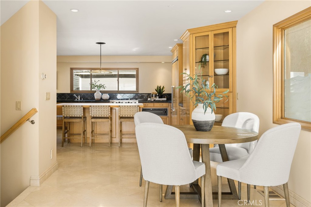 78 A Surfside Avenue Surfside, CA 90743 - Photo 23 of 45 a view of a dining room with furniture