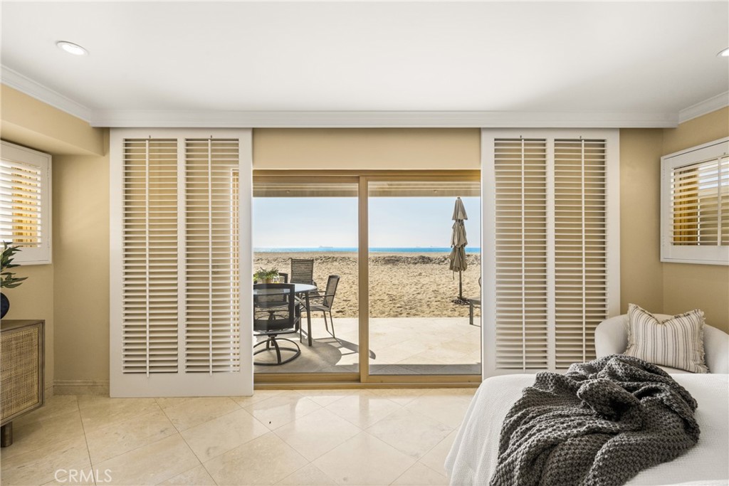 78 A Surfside Avenue Surfside, CA 90743 - Photo 3 of 45 a bed sitting in a bedroom next to a window