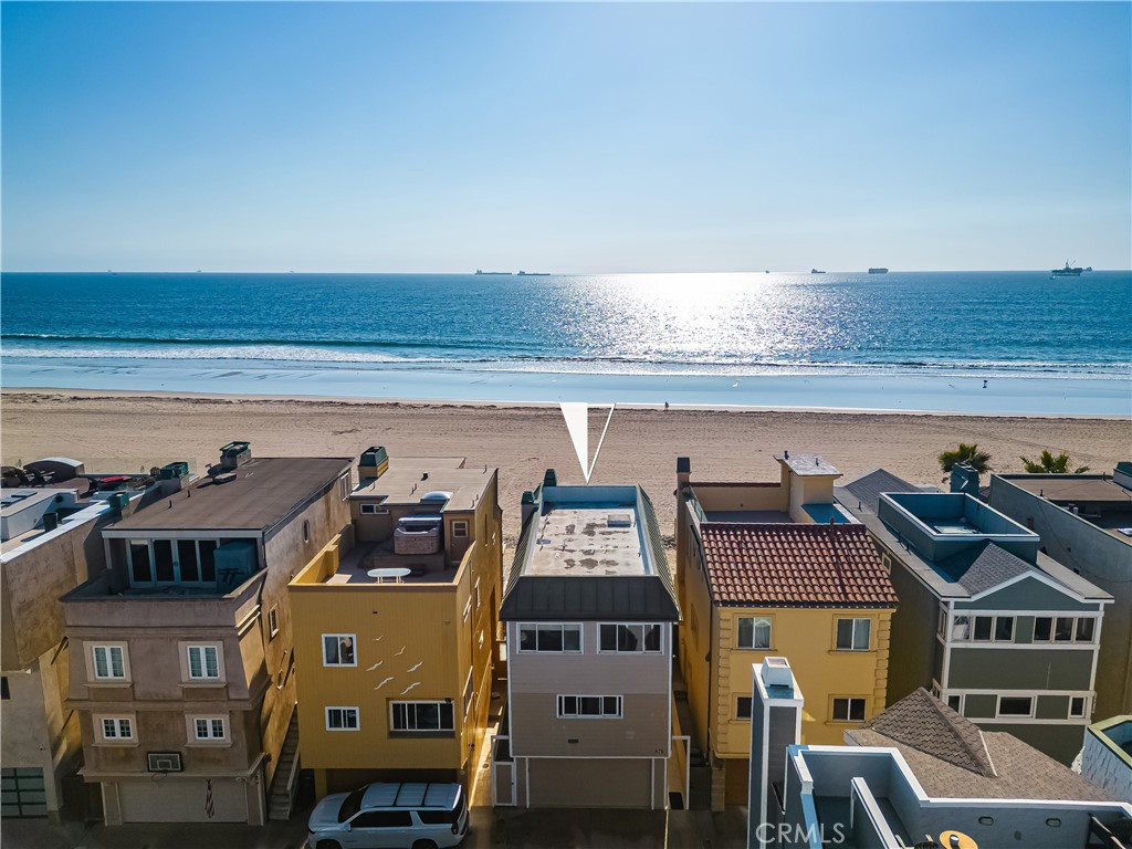 78 A Surfside Avenue Surfside, CA 90743 - Photo 39 of 45 a view of a balcony with chairs and wooden floor