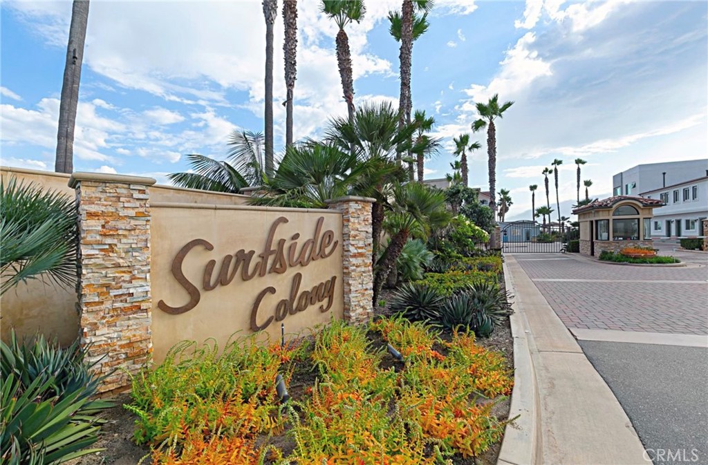 78 A Surfside Avenue Surfside, CA 90743 - Photo 43 of 45 a street sign on a wall next to a road