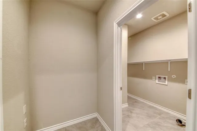 a bathroom with a tub and a shower