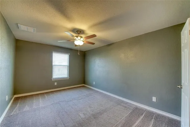 a bathroom with a sink double vanity and a mirror