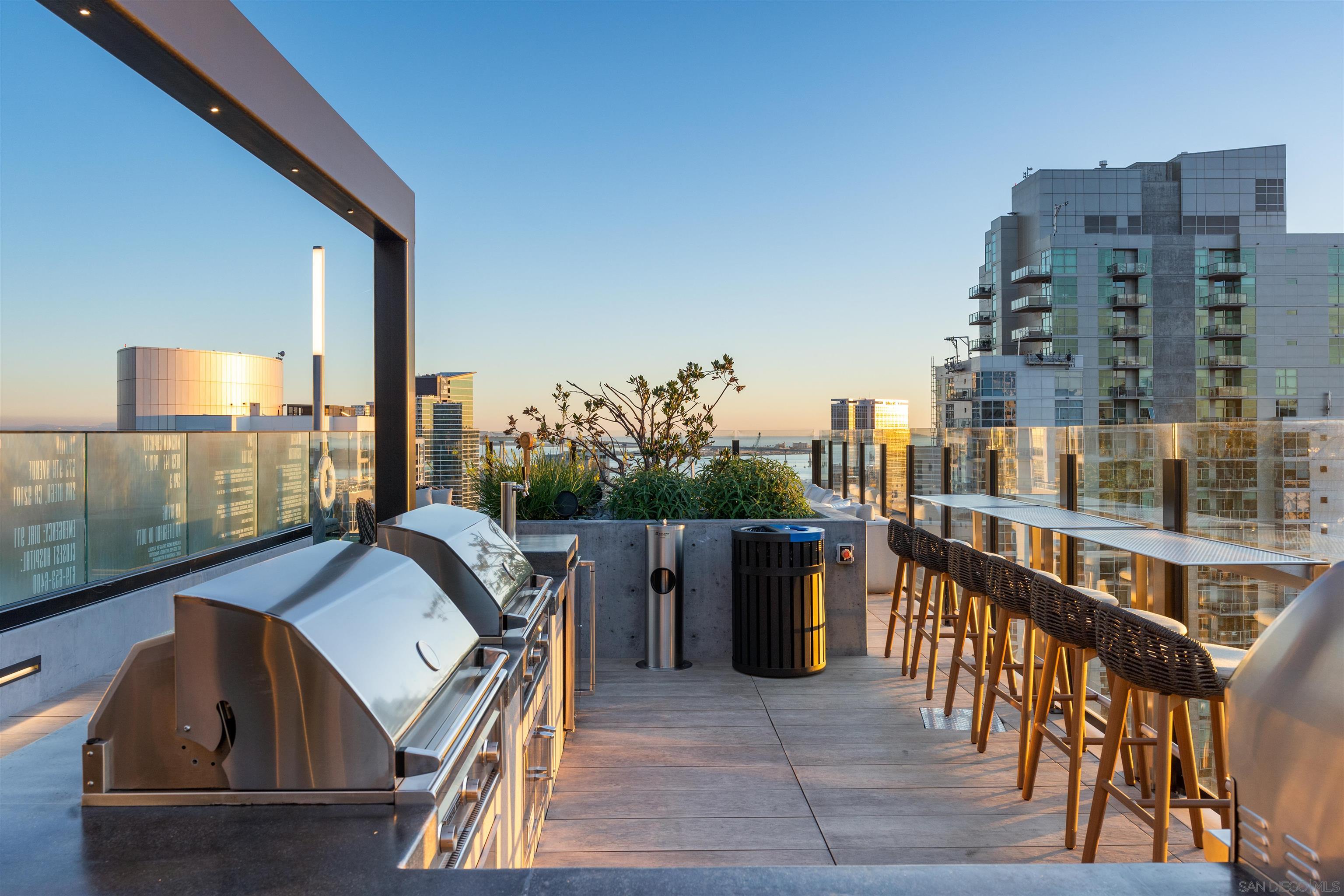 a balcony view with a seating space