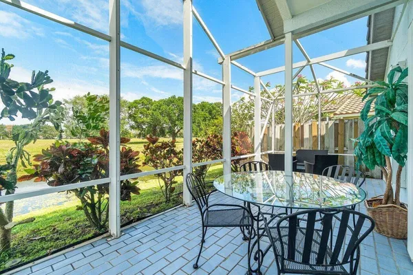 a view of an outdoor dining space with furniture
