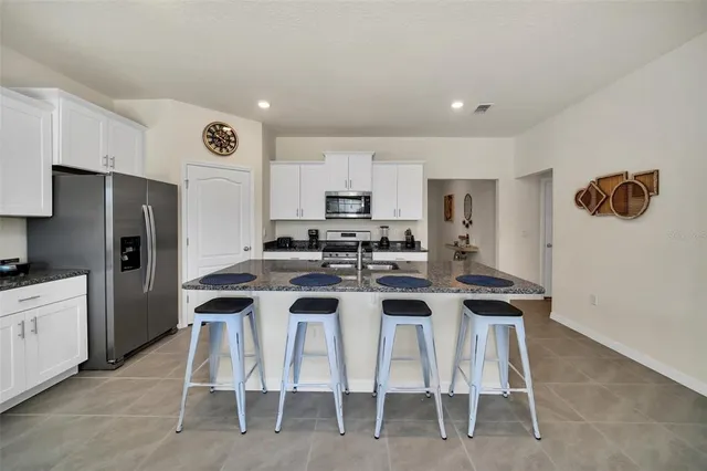 $699,000 | 7876 Oak Reflection Loop, Davenport, FL 33837