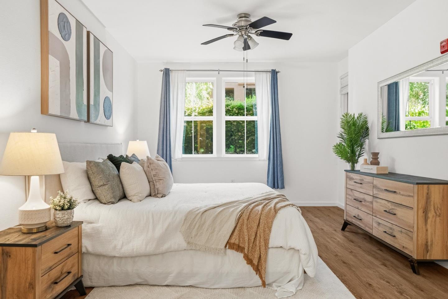 1390 Saddle Rack Street, Unit 223 San Jose, CA 95126 - Photo 12 of 36 a bedroom with a large bed and a window