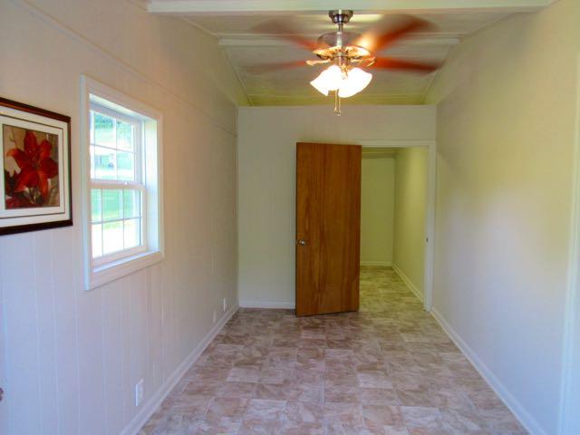 21 Dog Branch Road Pleasant Shade, TN 37145 - Photo 15 of 30 This portion was added on a few years ago and now upgraded with new paint, flooring, and lighting. Front portion would be a good area for the kids to hang out, play videos, etc and back would make a nice office or just a huge closet!