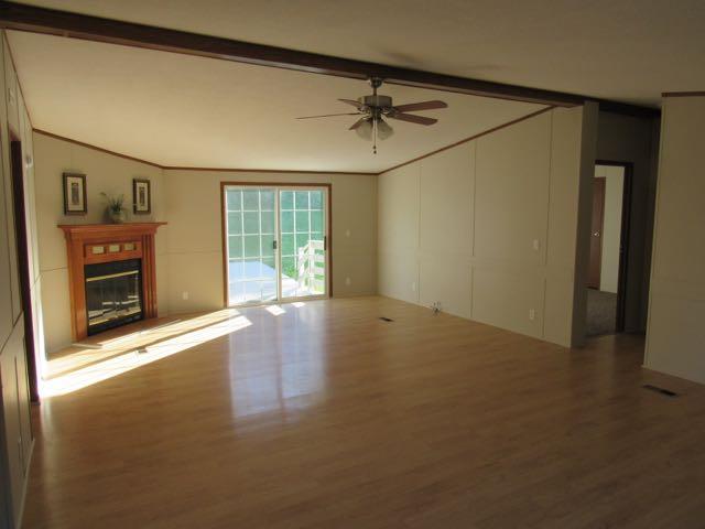 21 Dog Branch Road Pleasant Shade, TN 37145 - Photo 9 of 30 Huge living room with fireplace. Plenty of room for a big family and lots of guests.