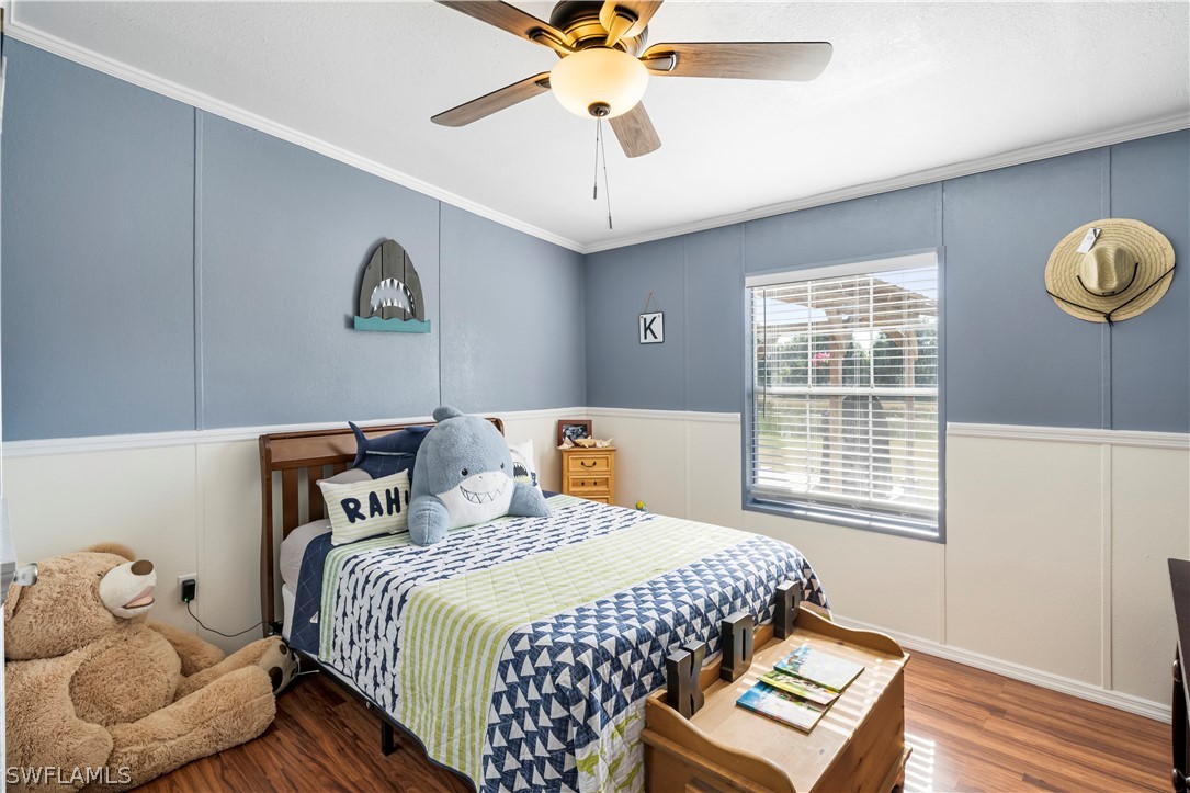 2401 Wendy Road Fort Denaud, FL 33935 - Photo 9 of 35 a bedroom with bed and window
