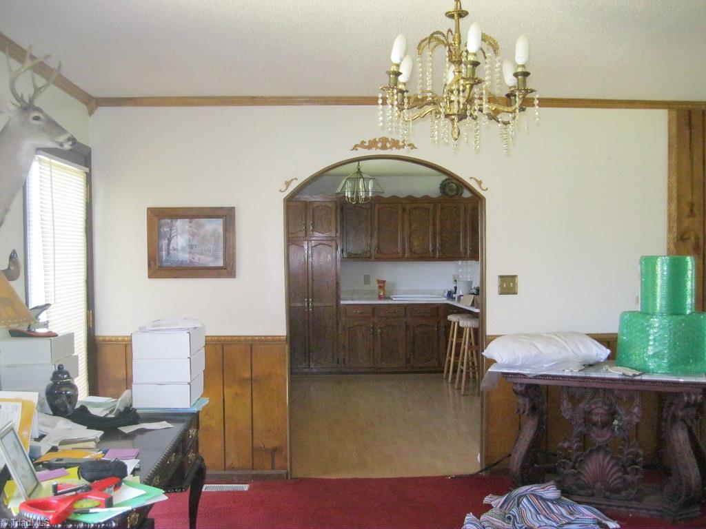 3053 Fairview Farm Road Asheboro, NC 27205 - Photo 15 of 19 Arched doorway leading in to kitchen from dining area.