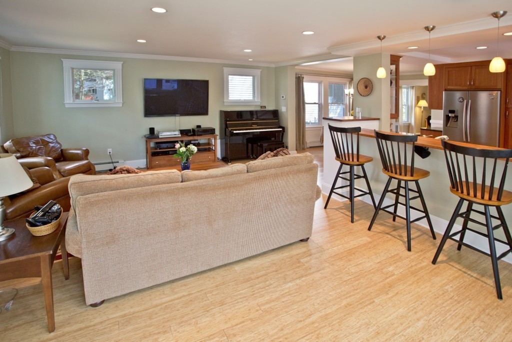 11 Brattle Place Arlington, MA 02474 - Photo 13 of 30 a view of a dining room with furniture and a flat screen tv