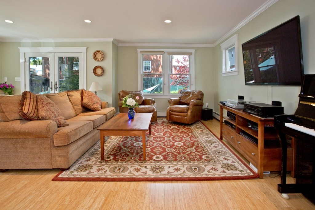 11 Brattle Place Arlington, MA 02474 - Photo 15 of 30 a living room with furniture and a flat screen tv