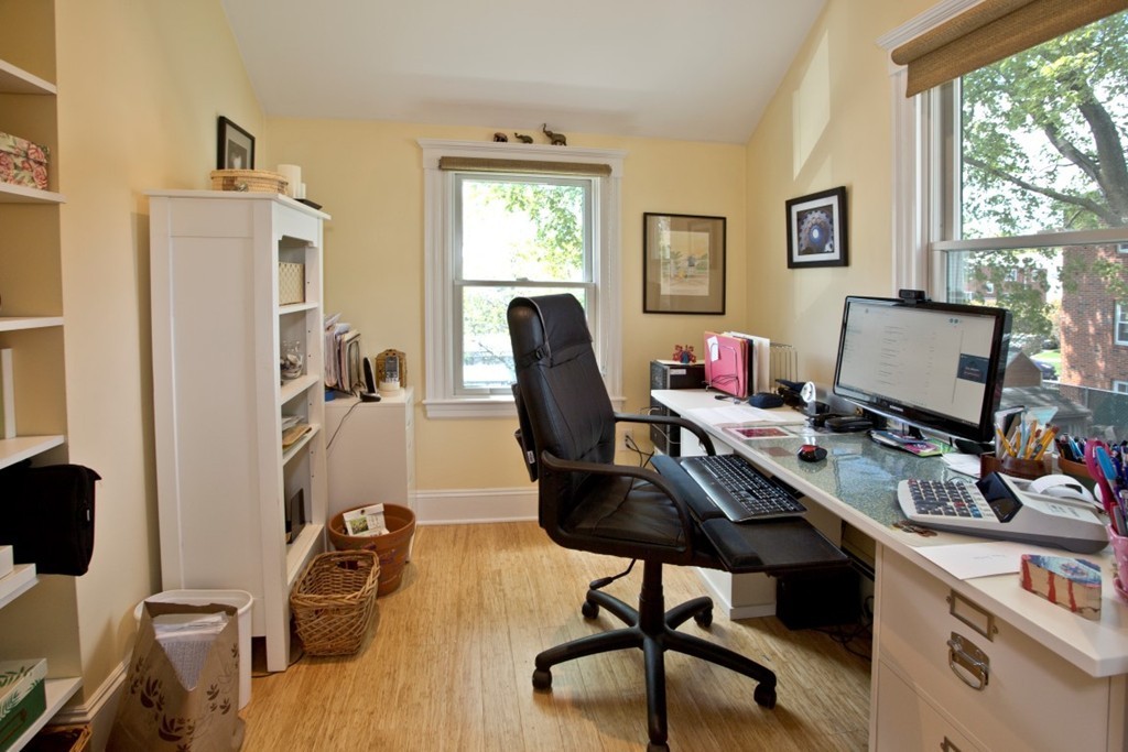 11 Brattle Place Arlington, MA 02474 - Photo 24 of 30 a view of a workspace with furniture and a window