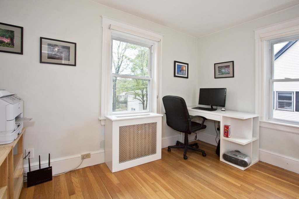 11 Brattle Place Arlington, MA 02474 - Photo 28 of 30 a view of a workspace with furniture and a window
