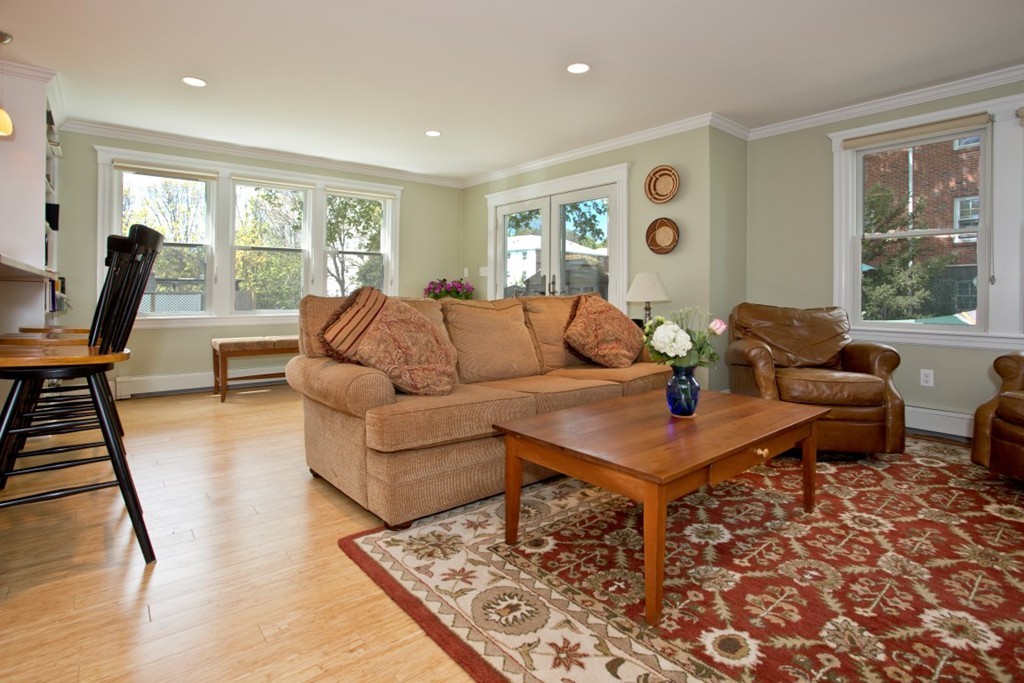 11 Brattle Place Arlington, MA 02474 - Photo 10 of 30 a living room with furniture and a window