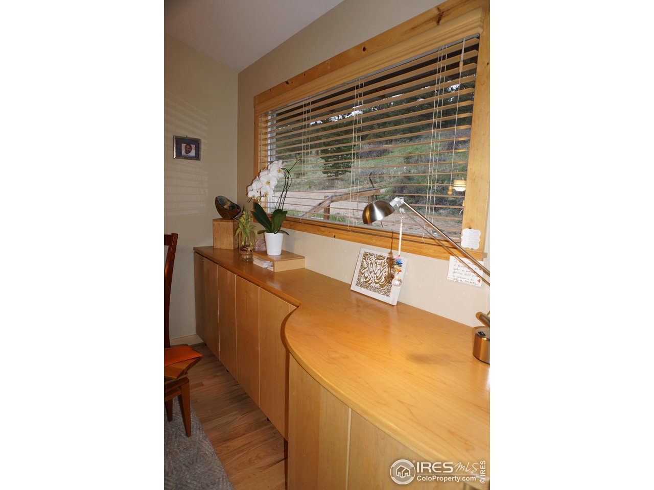 536 Taylor Road Lyons, CO 80540 - Photo 15 of 40 Custom maple cabinets in dining area