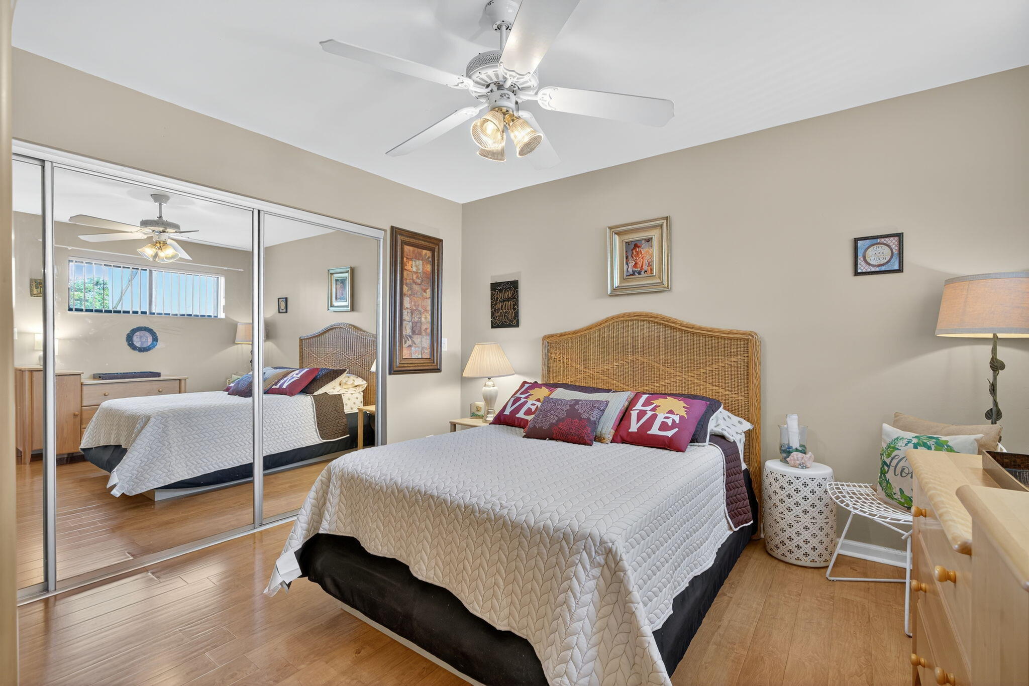 1605 Highway 1, Unit 8E Jupiter, FL 33477 - Photo 15 of 47 a bedroom with a bed and a couch