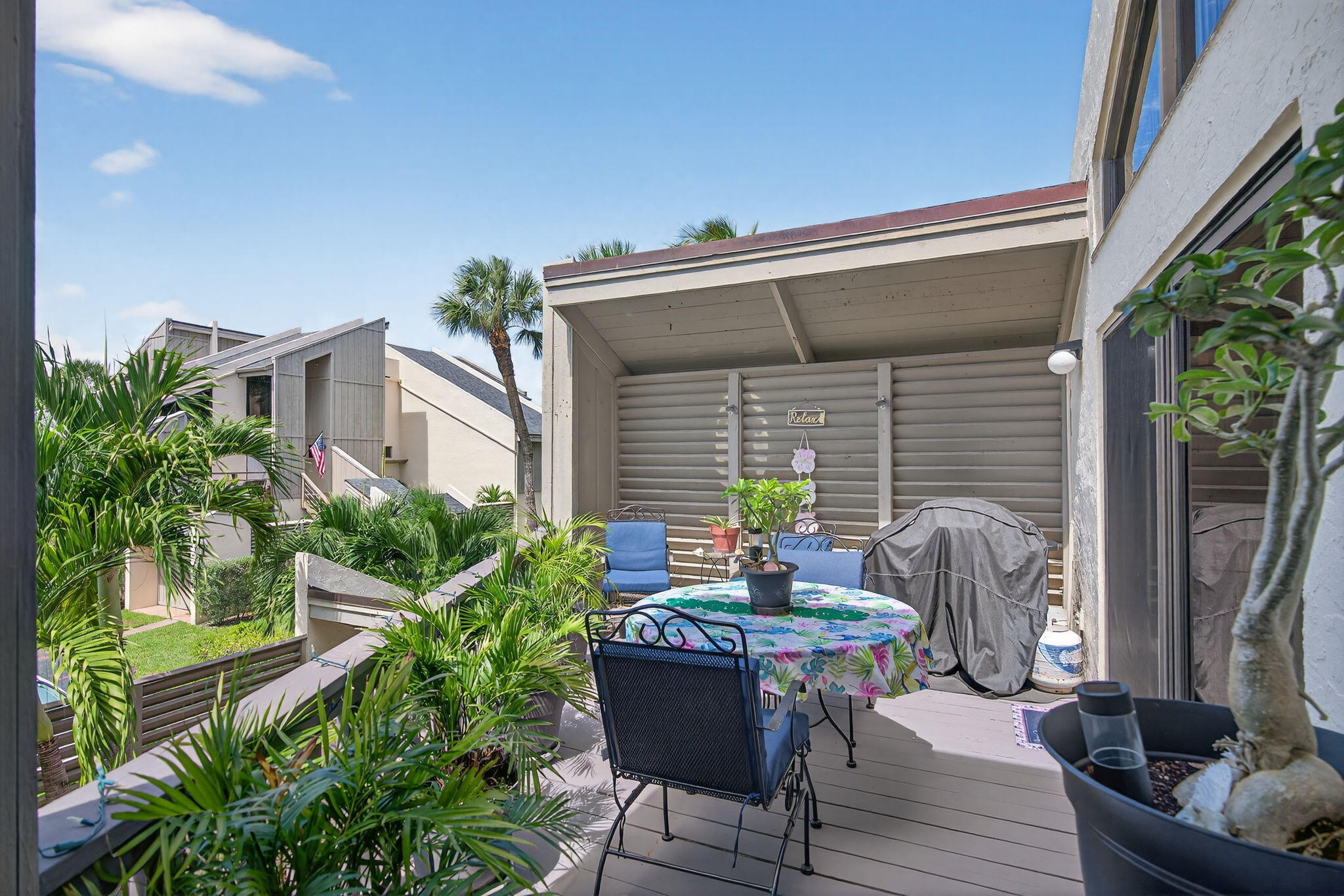 1605 Highway 1, Unit 8E Jupiter, FL 33477 - Photo 24 of 47 a house view with a seating space