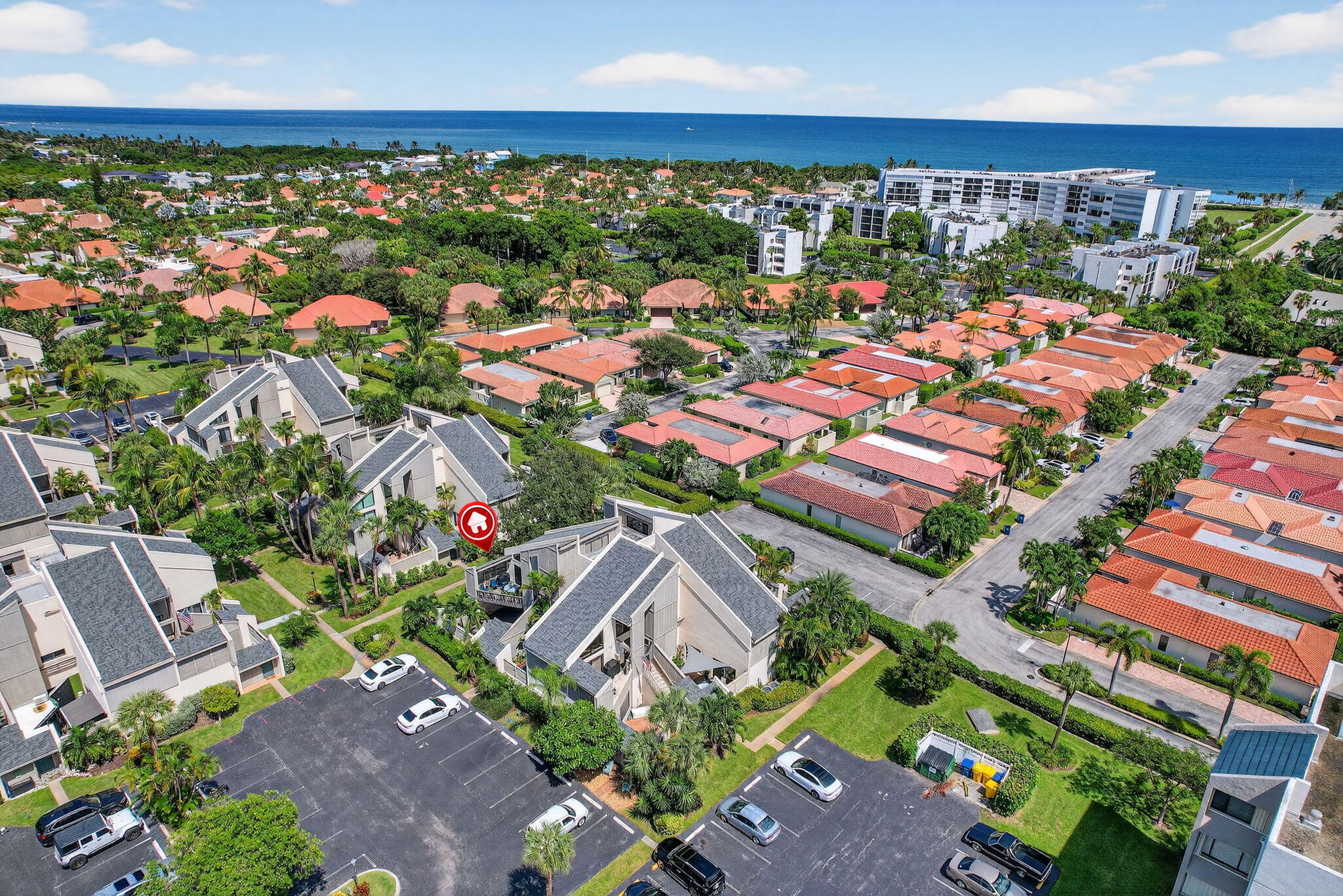 1605 Highway 1, Unit 8E Jupiter, FL 33477 - Photo 33 of 47 an aerial view of residential houses with outdoor space and street view