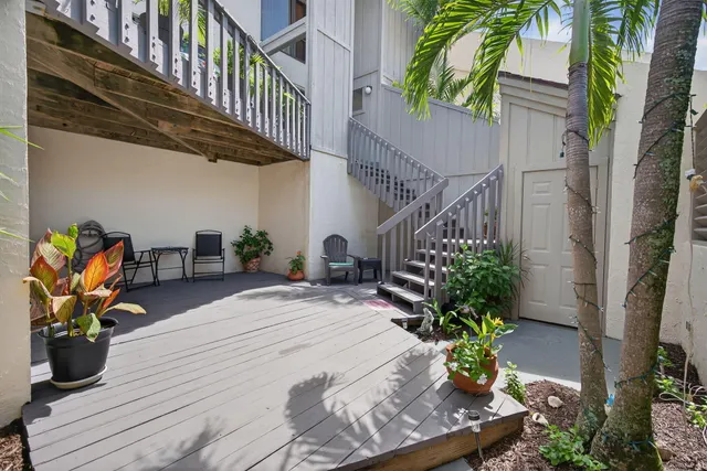 a vase with flowers sitting on a table