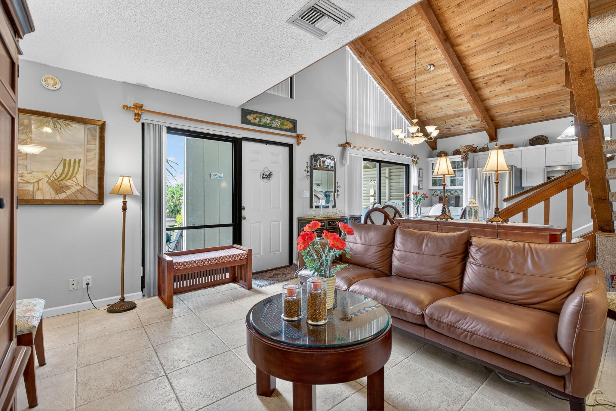1605 Highway 1, Unit 8E Jupiter, FL 33477 - Photo 9 of 47 a living room with furniture a rug and a large window