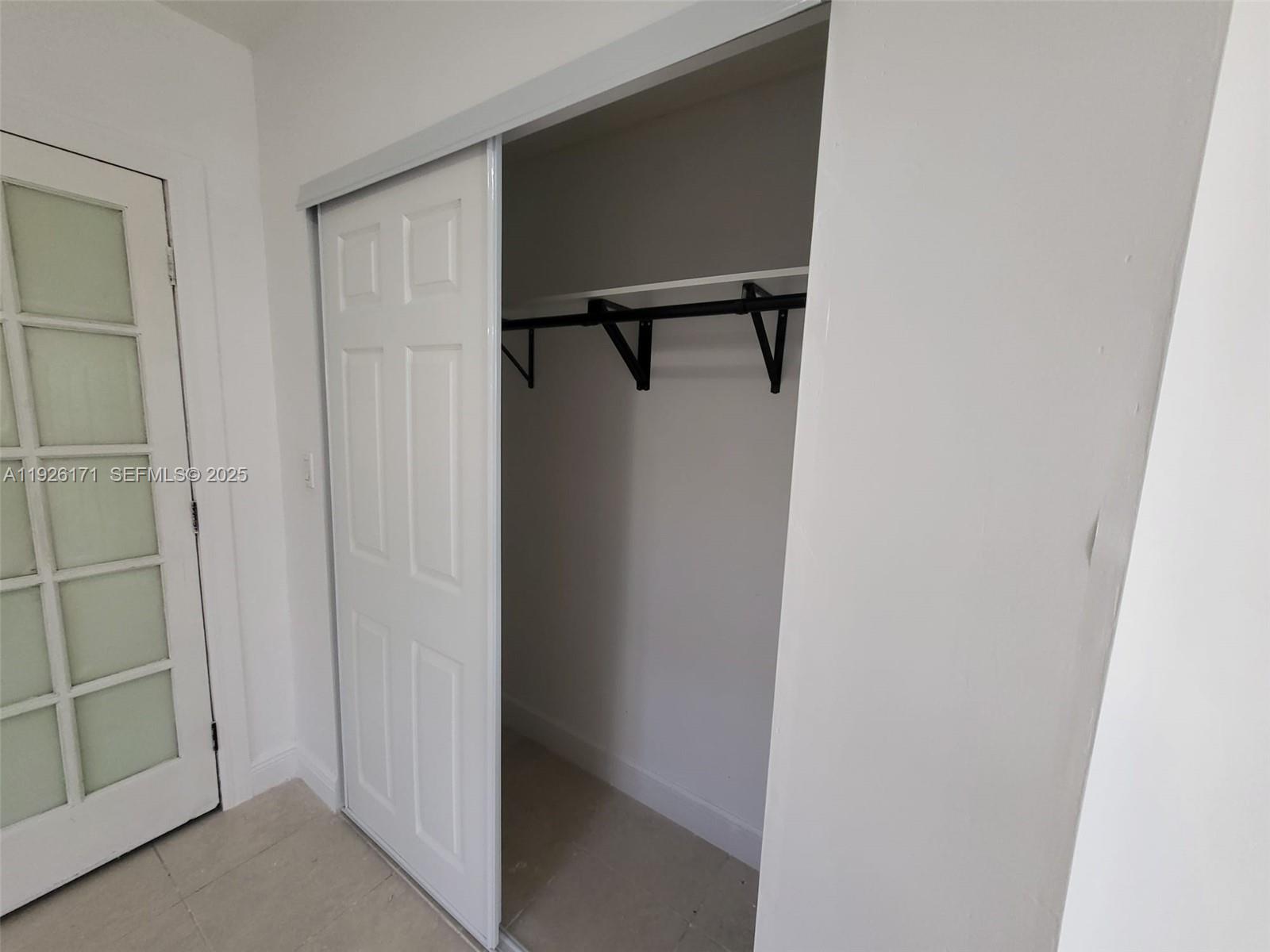 15320 Southwest 298th Terrace, Unit 15320 Homestead, FL 33033 - Photo 14 of 27 a view of walk in closet