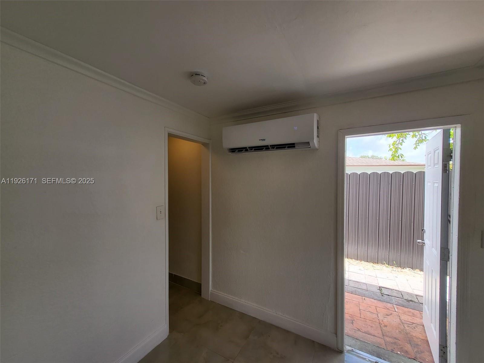 15320 Southwest 298th Terrace, Unit 15320 Homestead, FL 33033 - Photo 16 of 27 a view of an empty room