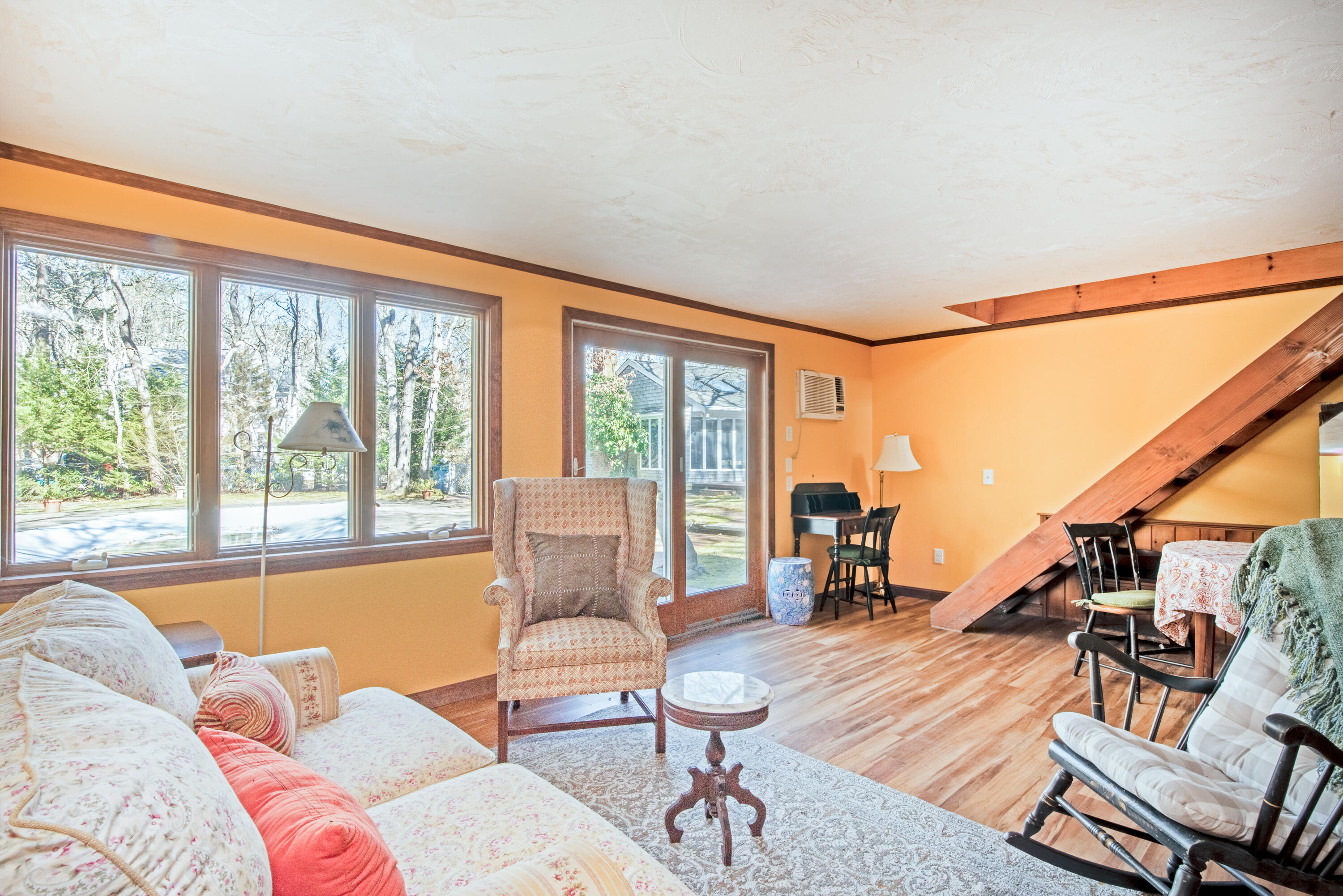 95 Herring River Road Wellfleet, MA 02667 - Photo 35 of 37 a living room with furniture and floor to ceiling windows