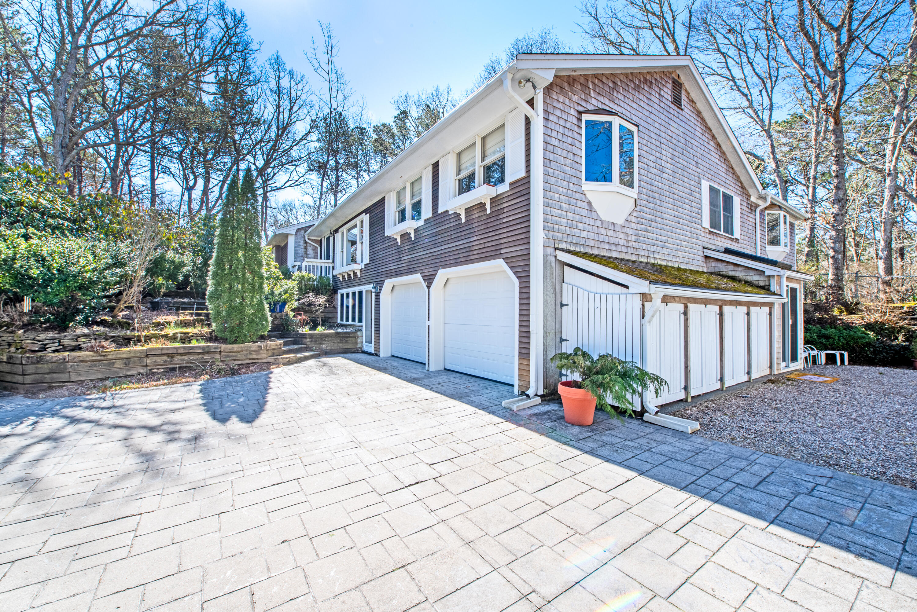 95 Herring River Road Wellfleet, MA 02667 - Photo 4 of 37 a front view of a house with sitting area