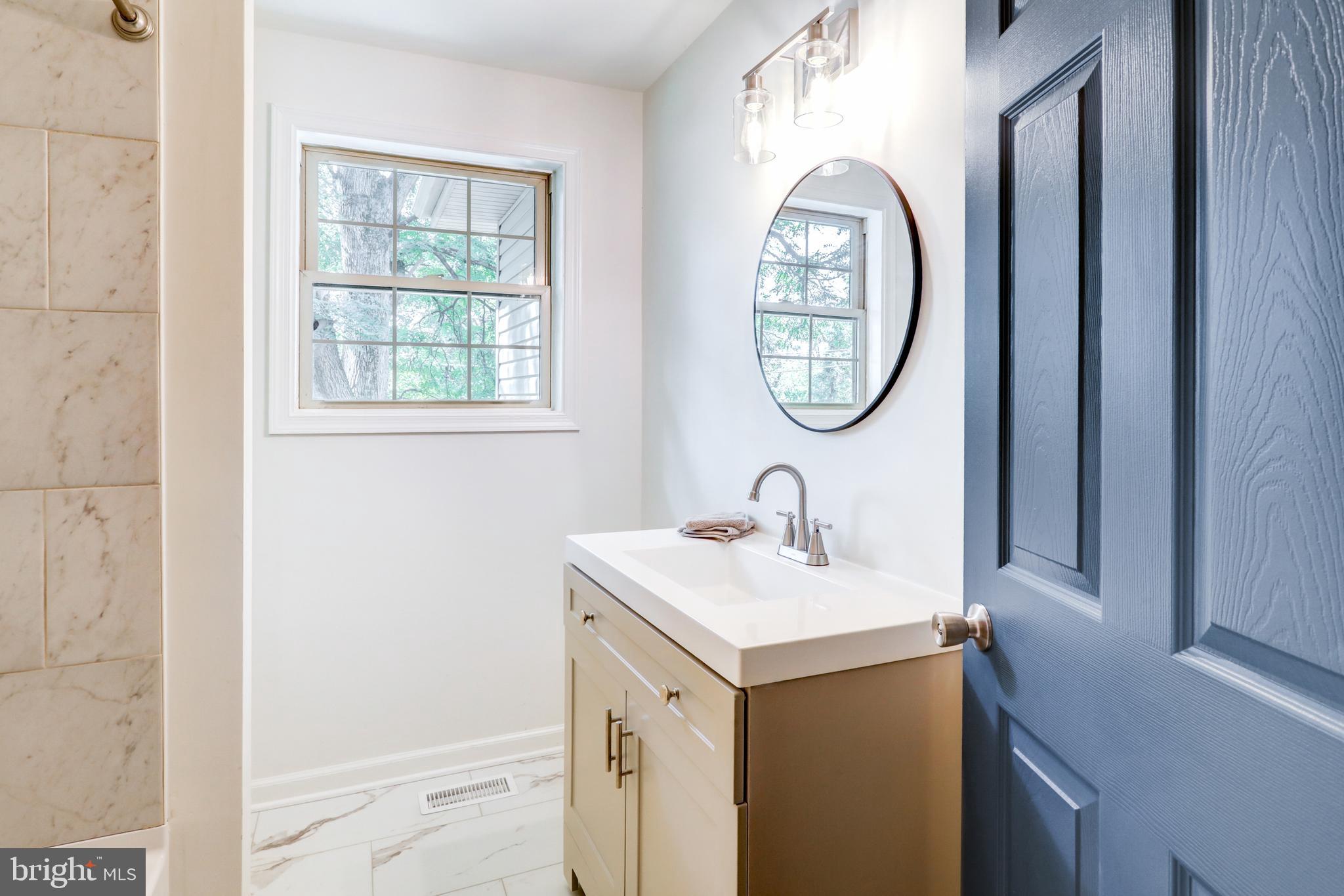 2560 Iron Springs Road Fairfield, PA 17320 - Photo 23 of 35 a bathroom with a sink and a mirror