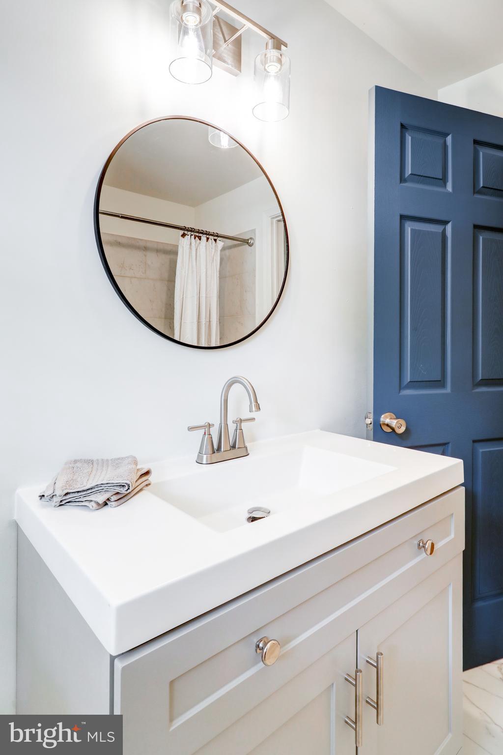 2560 Iron Springs Road Fairfield, PA 17320 - Photo 24 of 35 a bathroom with a sink and a mirror