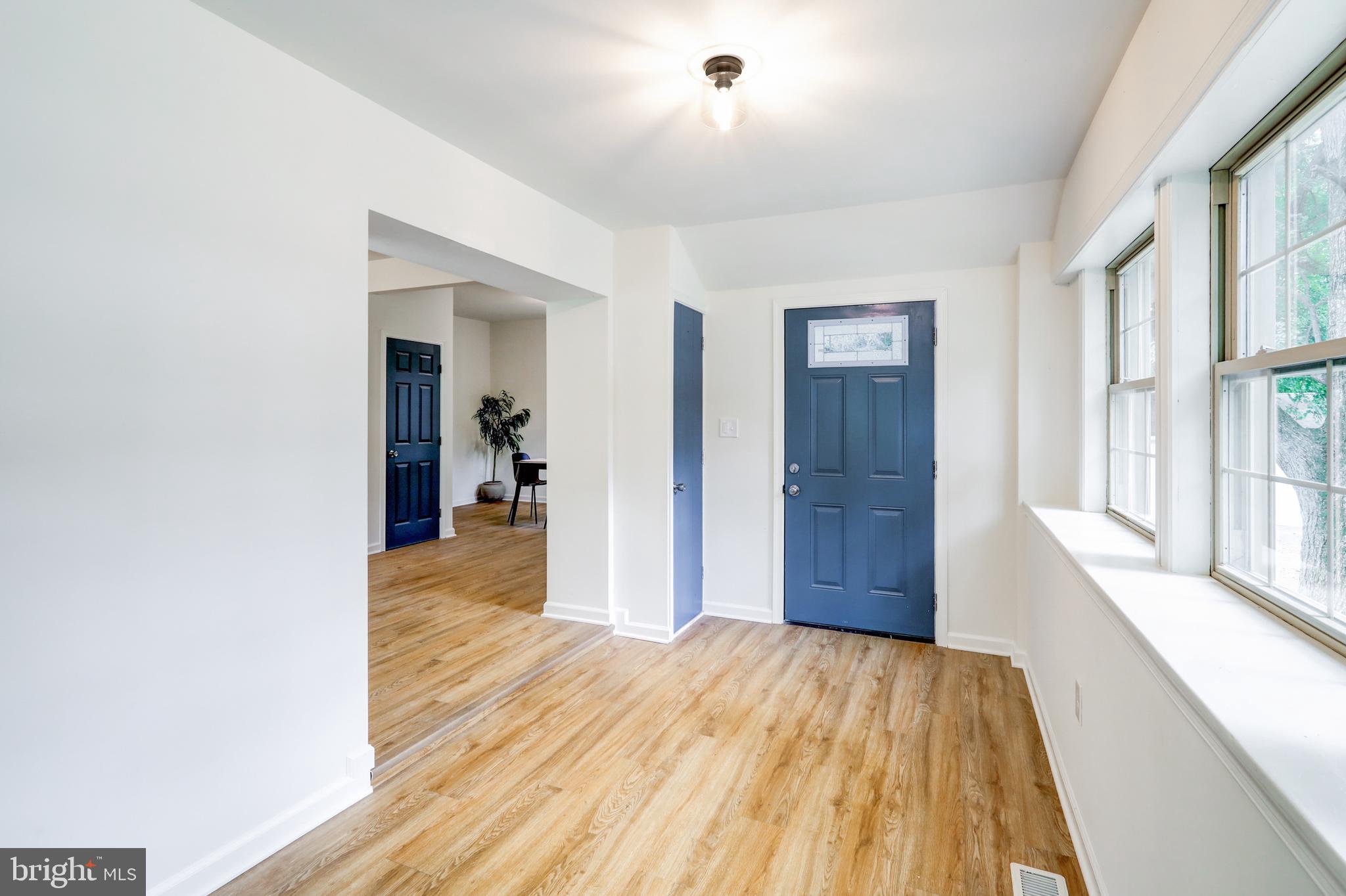 2560 Iron Springs Road Fairfield, PA 17320 - Photo 3 of 35 a view of a hallway with wooden floor and staircase