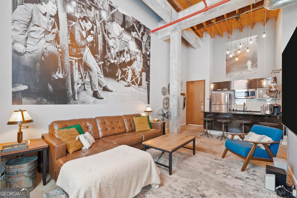 a outdoor living room with patio furniture