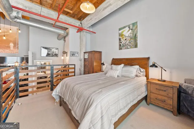 a bedroom with a bed and a closet