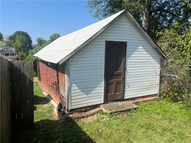 a view of backyard with green space