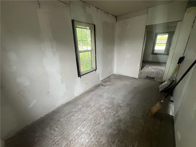 an empty room with windows