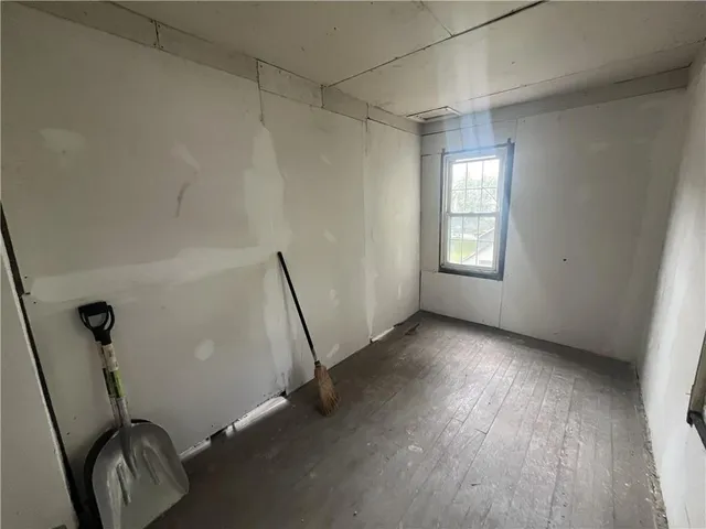 a view of an empty room and window
