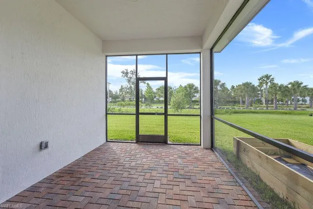 a view of swimming pool with seating space