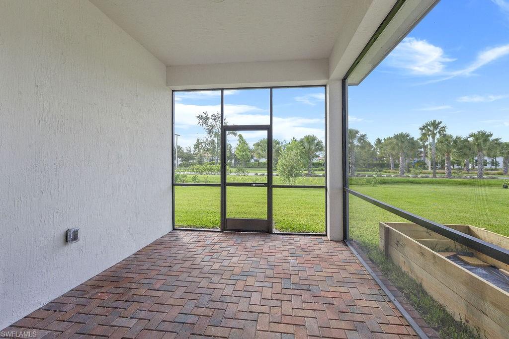 5293 Marano Drive Ave Maria, FL 34142 - Photo 21 of 23 a view of swimming pool with seating space