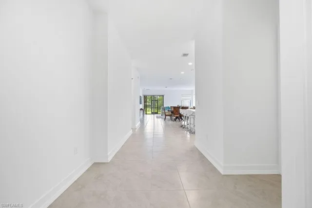 a view of a livingroom with furniture and a rug
