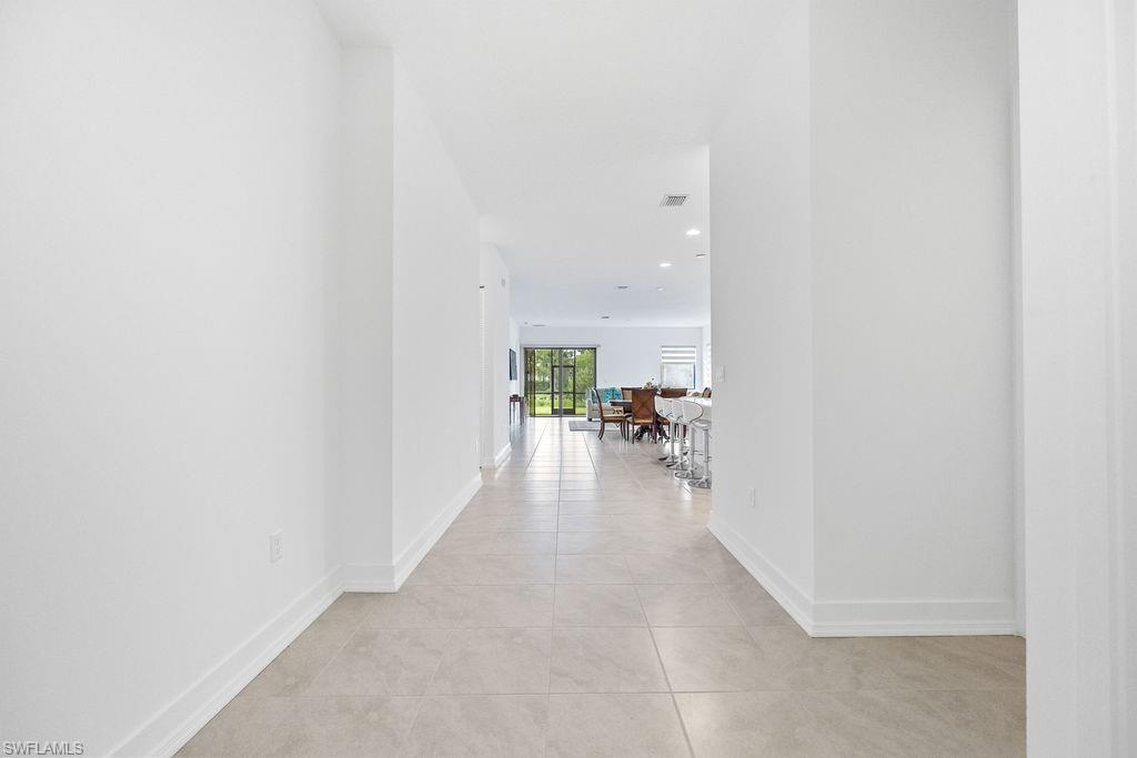 5293 Marano Drive Ave Maria, FL 34142 - Photo 3 of 23 a view of a livingroom with furniture and a rug