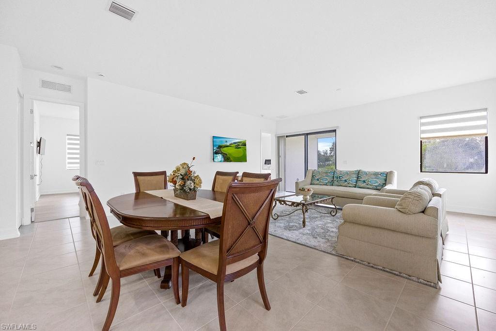 5293 Marano Drive Ave Maria, FL 34142 - Photo 8 of 23 a view of a dining room with furniture