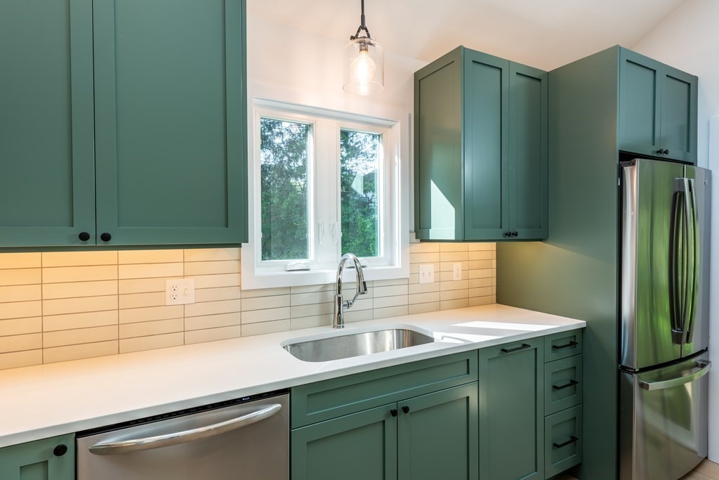 90 Memorial Drive Amherst, MA 01002 - Photo 12 of 38 a kitchen with a sink and a large window