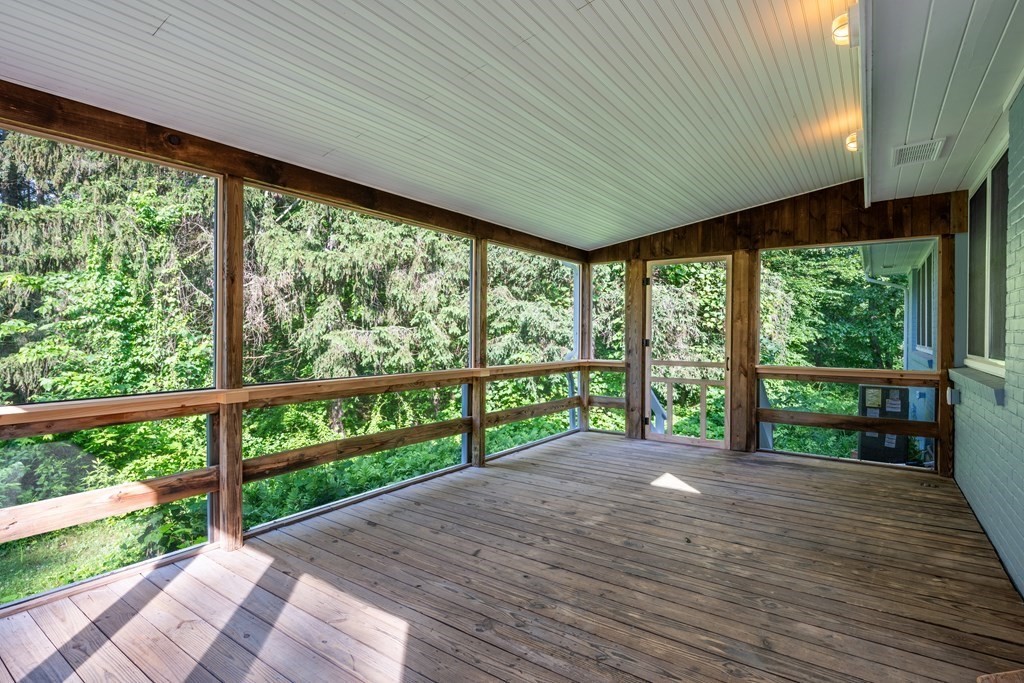 90 Memorial Drive Amherst, MA 01002 - Photo 14 of 38 a view of a porch with wooden floor and outdoor space