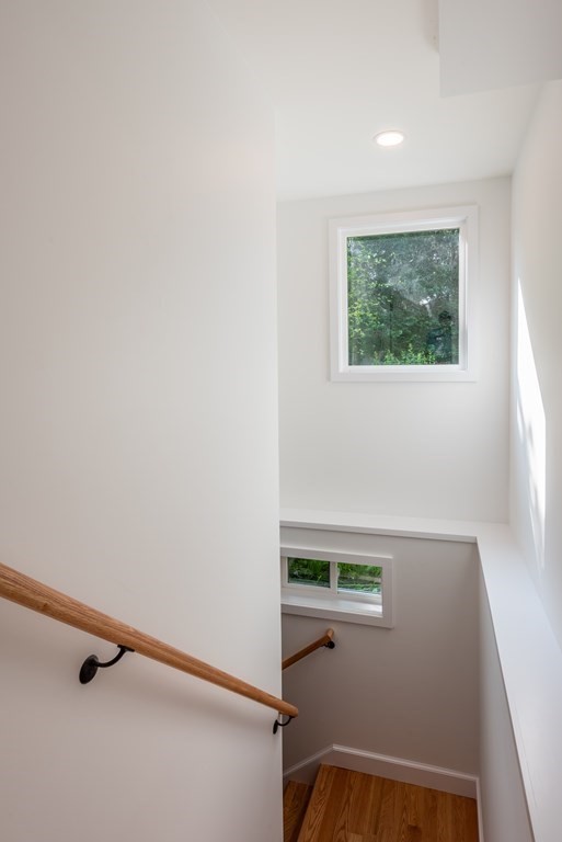 90 Memorial Drive Amherst, MA 01002 - Photo 16 of 38 a view of a hallway with a table and a window